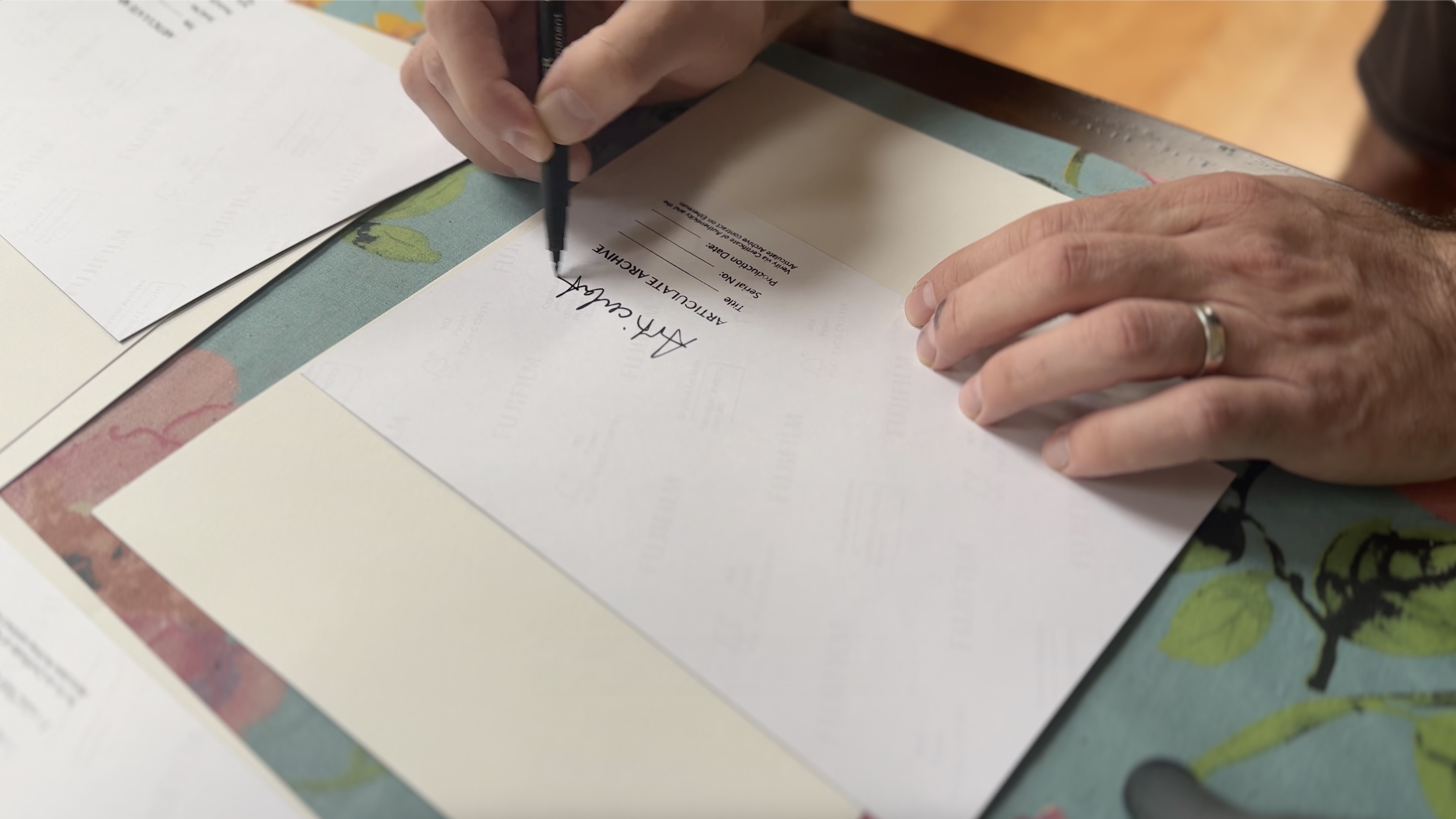 A signed, serial-numbered OUTSIDERS print